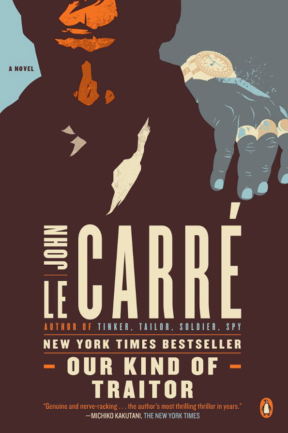 A book cover for the novel “Our Kind of Traitor” by John le Carré. An illustration shows a silhouetted figure in a dark coat, with a hand wearing several gold rings reaching into the frame.