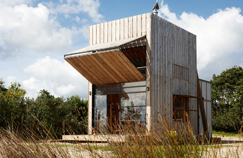 An interview with Crosson Clarke Carnachan about their beach hut attached to sled rollers  