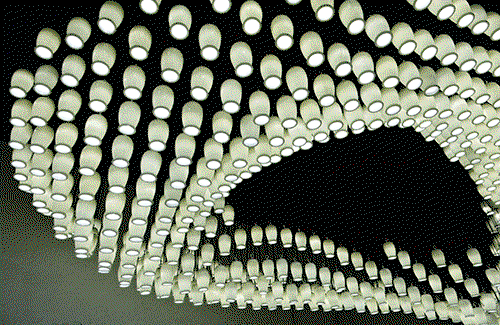 1,664 reused yoghurt pots + bucket loads of creativity = stunning light installation