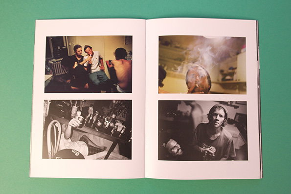 An open photobook shows four black and white photographs across two pages. The images capture candid moments of people in domestic settings, including a group chatting in a room and a close-up of a person looking at the camera.