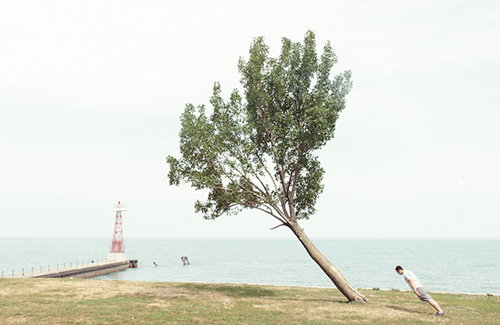 Paul Octavious gets his lean on… With some askew-looking trees