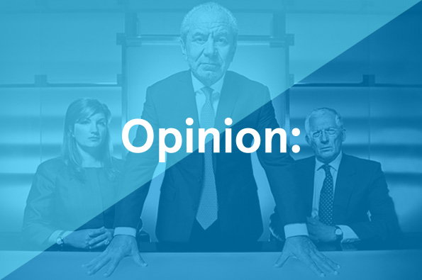 Three people in formal business attire look seriously at the camera. A blue colour overlay covers the image, with the word “Opinion:” written in white across the centre.