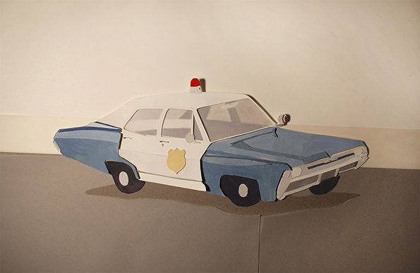 A paper model of a police car with a blue bonnet and boot and a white body. A small red siren sits on the roof.