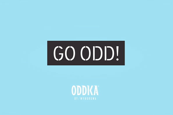 A light blue background features a black rectangular block with the words “GO ODD!” in white, stencil-style lettering. Below this, a white logo reads “ODDKA” with smaller text underneath that says “BY WYBOROWA”.