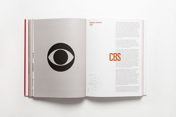 An open book shows the CBS eye logo on the left page and a detailed case study on the right. The right page includes the “CBS” wordmark and a technical diagram of the logo’s construction.