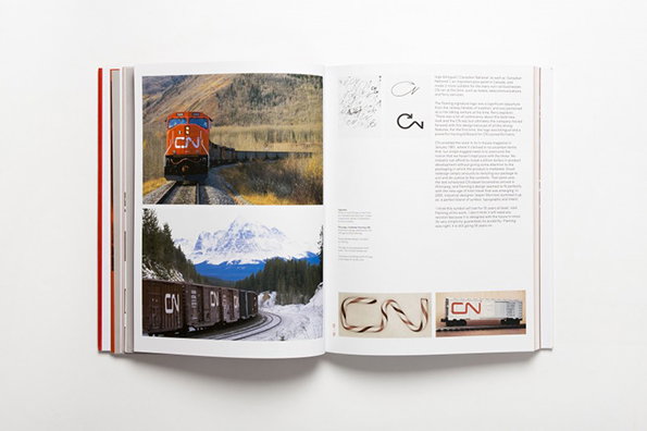 An open book showing the history of the Canadian National railway branding. The left page features two photographs of red and brown “CN” trains travelling through autumn and winter landscapes.