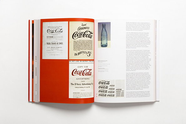 An open book displays a collection of vintage Coca-Cola advertisements and a photo of a glass bottle. The pages feature various layouts with the “Coca-Cola” wordmark and accompanying text.