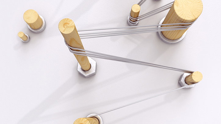 A 3D render of several light wood cylinders of varying heights standing upright on a white surface. Thin silver wires stretch between the cylinders, creating a network of geometric lines.