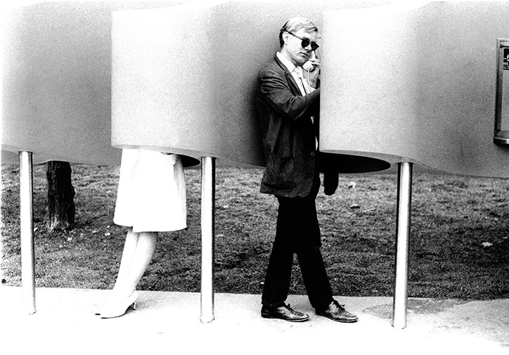 Billy-Name-its-nice-that-Andy-Warhol-on-payphone-at-World's-Fair_-1964.jpg