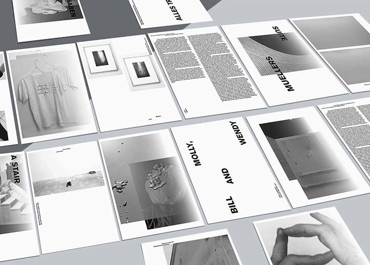 A collection of black and white printed pages laid out on a grey surface. The pages feature a mix of photography, dense blocks of text and bold typography, including the words “Molly, Bill and Wendy”.