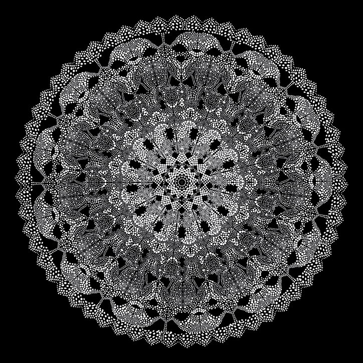 A white stippled mandala on a black background. The intricate circular pattern is composed of thousands of tiny dots forming symmetrical, lace-like layers.