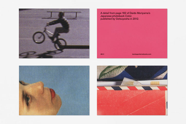 Four cards are arranged in a grid. They feature a person on a bicycle, a pink card with text about Daido Moriyama’s photobook “Color”, a close-up of a face, and a red and white striped pattern.