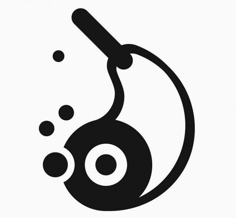 A black and white graphic illustration of a circular shape with a central hole, resembling a record or a disc. A thick line curves from the top, ending in a diagonal pill shape, with several small dots floating to the left.