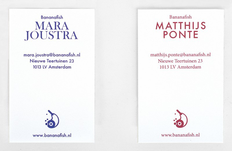Two white business cards for Bananafish are laid side by side. One reads “Mara Joustra” in blue text, and the other reads “Matthijs Ponte” in red. Both cards include contact details for an Amsterdam address and a small circular logo at the bottom.