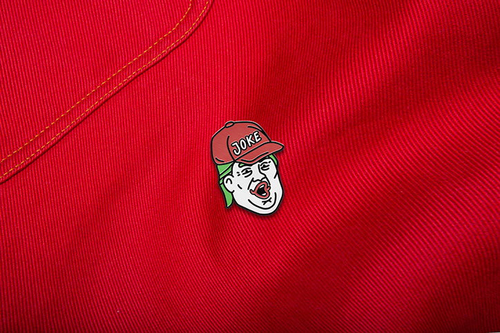 Sagmeister-Walsh-Trump_joker-pin.jpg