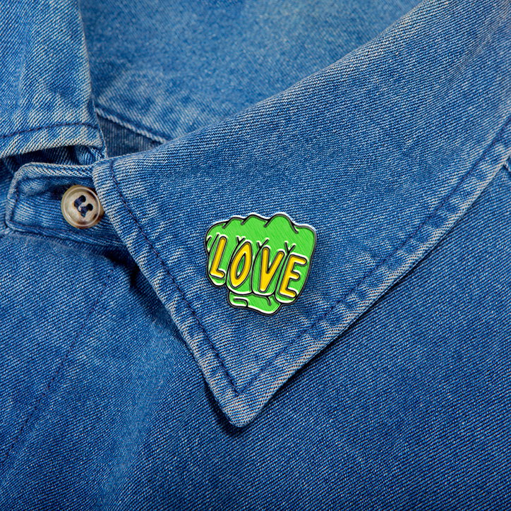 Sagmeister-Walsh-Pins-Won't-Save-the-World_Love-Pin.jpg