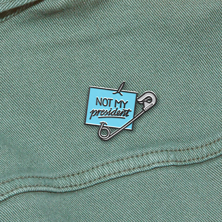 Sagmeister-Walsh-Pins-Won't-Save-the-World_SW_Not-My-President.png