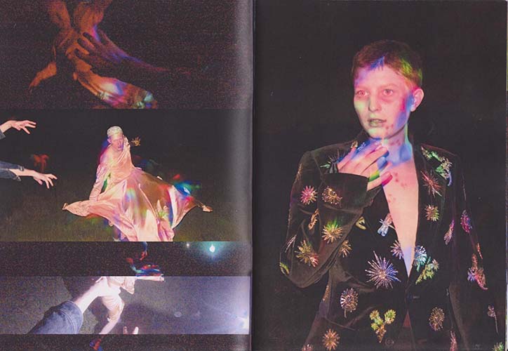A two-page spread from a book. The right page shows a person in a black blazer adorned with colourful, star-like embroidery, their face and clothes dappled with iridescent light. The left page contains three smaller, grainy images of a person in a flowing peach-coloured garment moving through a dark space.
