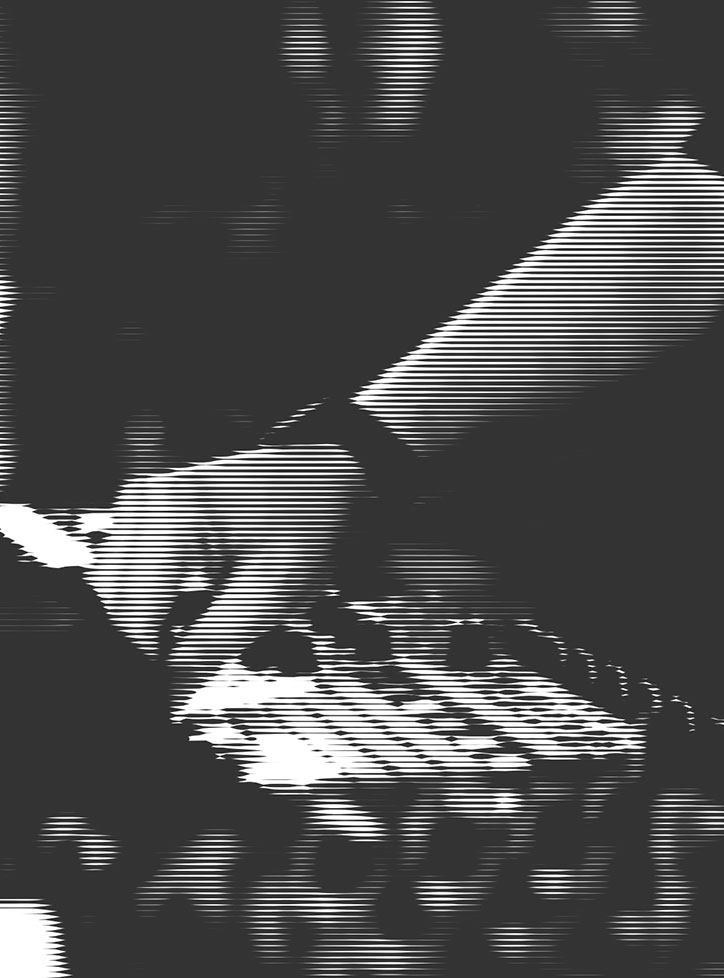 A high-contrast, black and white image of a person’s hand reaching over a mixing desk. The image is distorted by a heavy horizontal line effect, creating a digital, glitchy appearance.