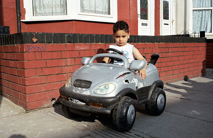 Boy-with-BMW-toy-car-©-Mahtab-Hussain---You-Get-Me_INT.jpg