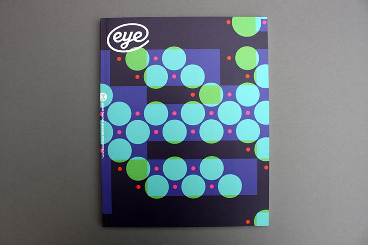 The cover of Eye magazine features a dark purple background with a pattern of overlapping light blue and green circles. The magazine’s logo, “eye”, appears in a white bubble in the top left corner.