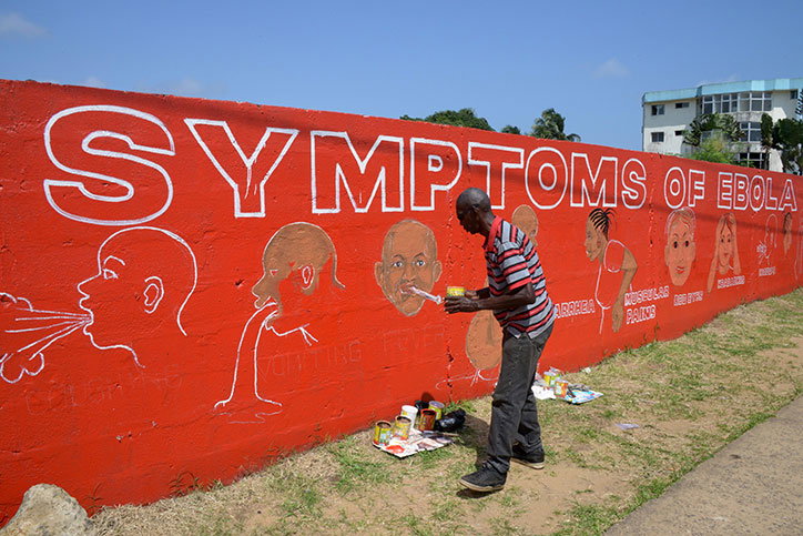 Can-Graphic-Design-Save-Your-Life-Wellcome-Trust-itsnicethat-Street-artist-Stephen-Doe-paints-an-educational-mural-about-Ebola-in-Liberia_-2014_-Credit-Dominique-Faget_-AFP_-Getty--Images.jpg
