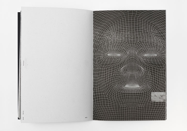 An open book shows a 3D wireframe render of a human face on the right page. The grid of white lines curves to define the eyes, nose and mouth against a dark background.