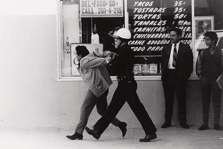 GeorgeRodriguez-LAPDArrestingaChicanostudentProtesterBoyleHeights-1970-Publicationitsnicethat.jpg