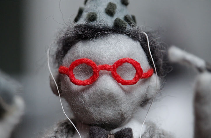 Rod puppets in intricate felt sets profess The Need to Be Alone for Alain de Botton
