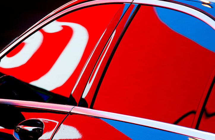 Photographer Nick Turpin captures cars bathed in the lights of Piccadilly Circus