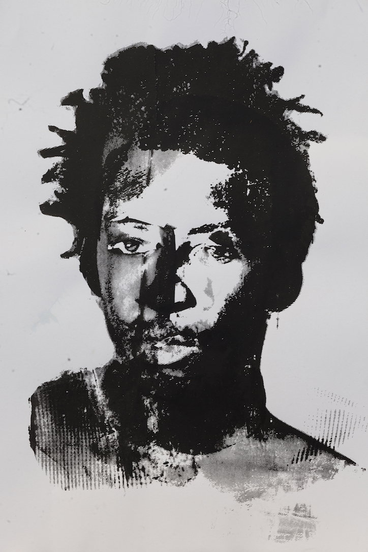 A high-contrast black and white print of a person’s face. The image is heavily stylised with deep shadows and textured, ink-like marks that blur the features.