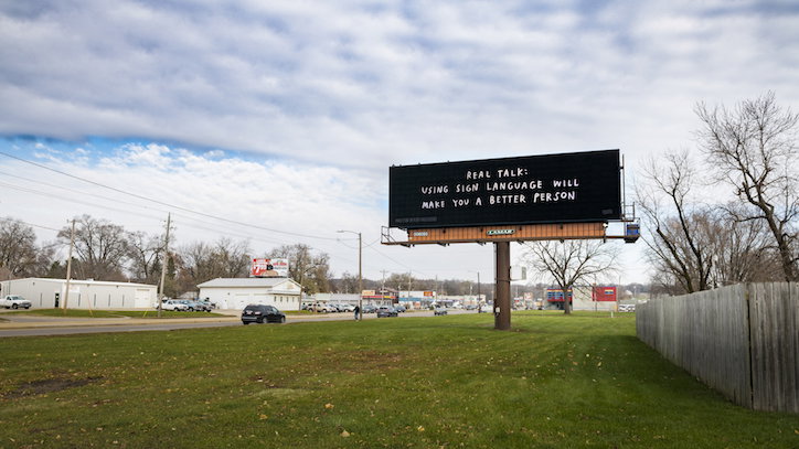 Christine_Sun_Kim__‘Using_Sign_Language_Makes_You_a_Better_Person’_(2018)_For_Freedoms_and_Brent_Isenberger_(Des_Moines__Iowa)__billboard__14_x_48_ft.jpg