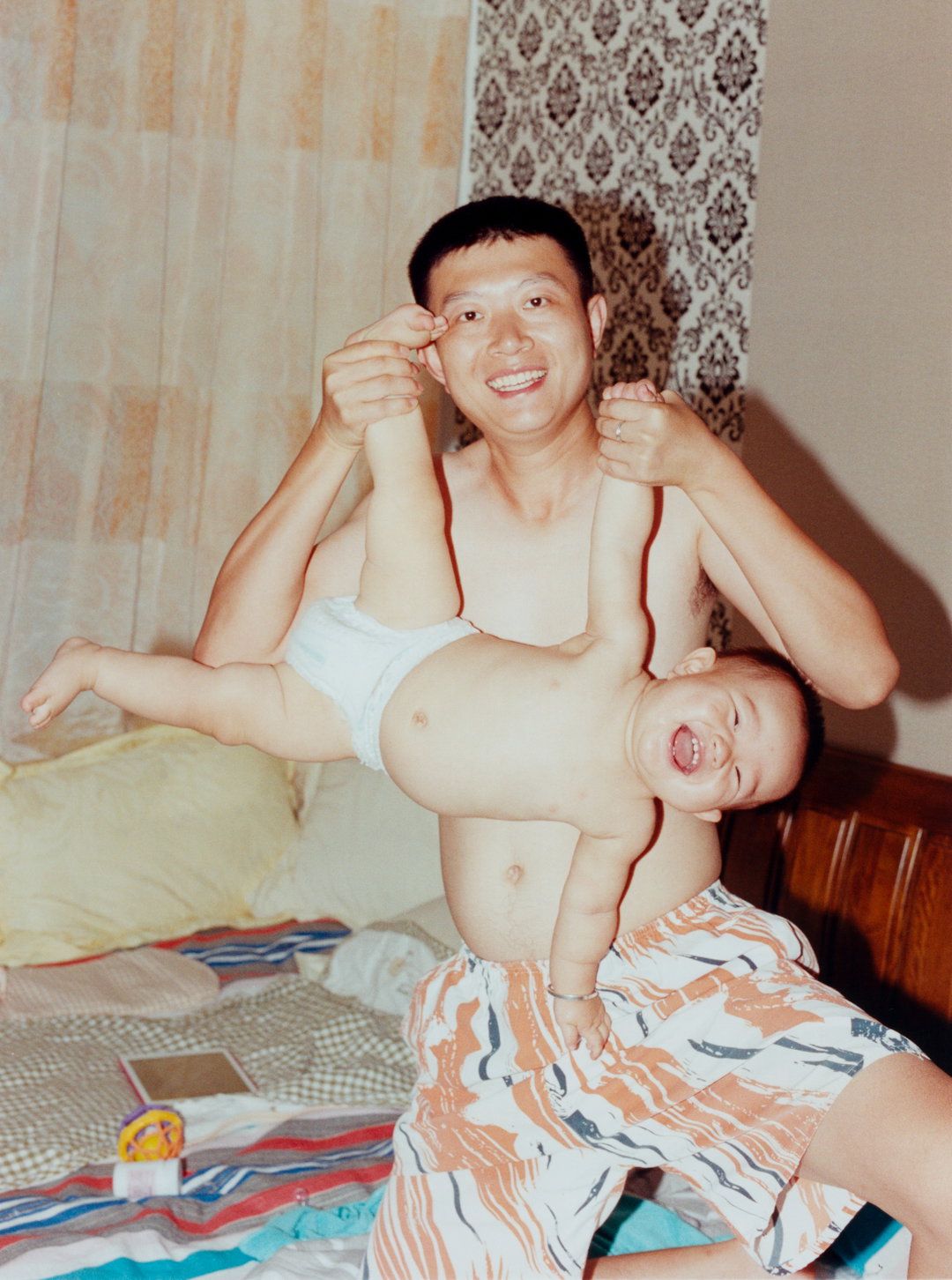 Alex Huanfa Cheng Chinese Wonderland__depicting parenthood_creative parents photography itsnicethat.jpg