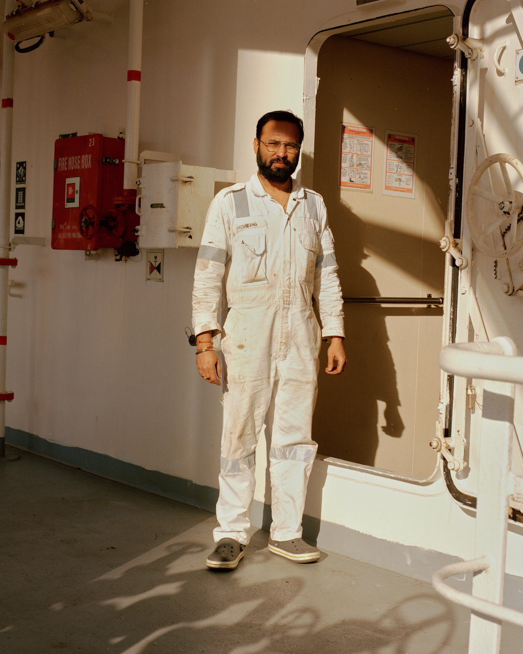 Life suspended between ports: Max Lancaster photographs the life and work of a shipping container crew