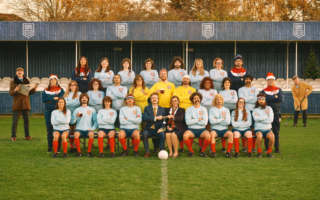 Isobel keeps the agency Christmas card tradition kicking with fake Sunday league