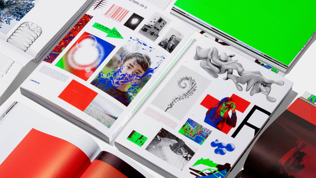 An open book displays a collage of images, including a portrait of a person with blue abstract shapes over their face. The pages feature a mix of photography, 3D renders, and bold red and green blocks of colour.