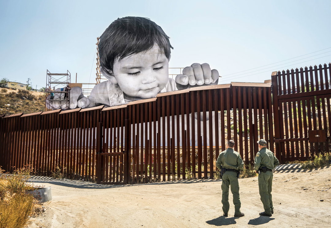 jr photography art itsnicethat_GIANTS,-Kikito-and-the-Border-Patrol,-Tecate,-Mexico---U.S.A.,-2017.jpg