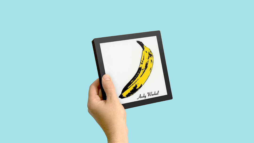 tom vek sleevenote product design itsnicethat_Sleevenote man hand with Velvet Underground cover on blue 1837.jpg
